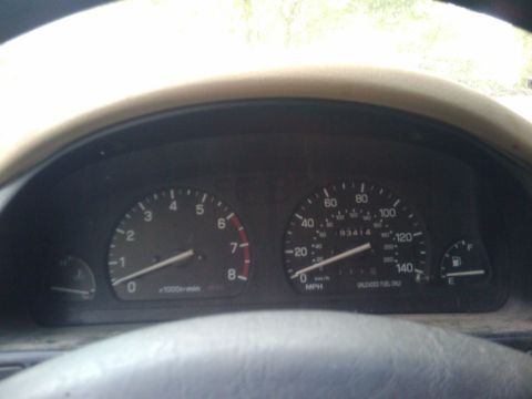 1998 Subaru Legacy - The dashboard shows the vehicle's speed, engine RPM, and fuel level, with an odometer reading of 93,414.