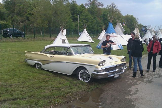 Two-tone yellow and white 1957 Ford Fairlane 500 hardtop coupe