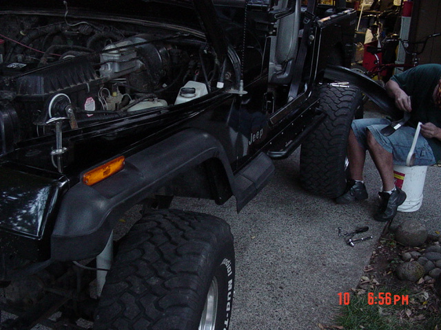 Putting the flares back on.  This was the worst part of the job <believe it or not>.