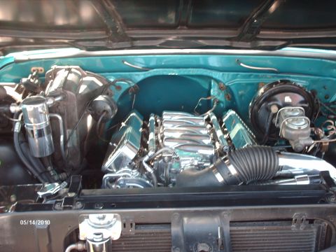 1992 Ford Bronco - Engine bay with chrome intake manifold and teal paint, dated 05/14/2010.