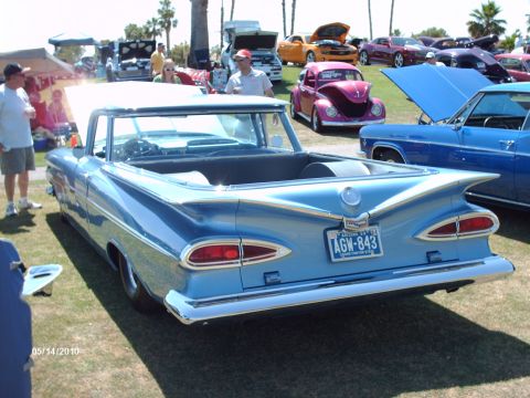 1992 Ford Bronco - A light blue 1959 Chevrolet El Camino convertible displays its distinctive fins at a car show.