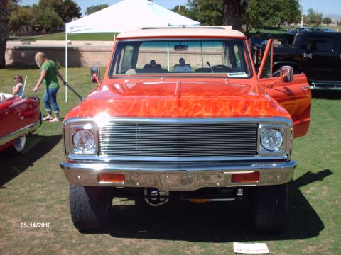 1992 Ford Bronco - This truck has custom flame paintwork and a chrome grille. A date stamp shows 05/14/2010.