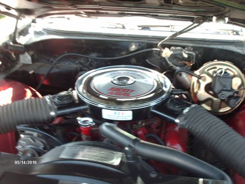 Engine bay with a chrome air cleaner labeled "Rocket 455" and a brake booster