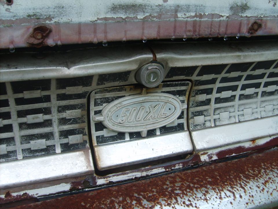 1963 Ford Galaxie 500 XL emblem on front grille