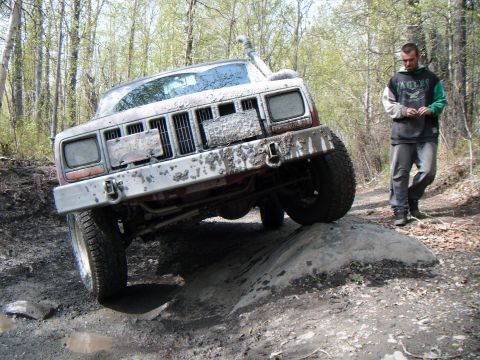 1998 Jeep Cherokee - Jeep Cherokee navigating a challenging off-road course.
