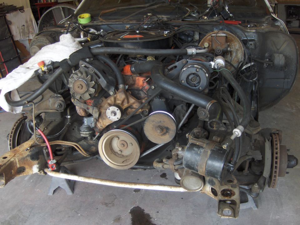 Engine bay with V8 engine and front suspension components