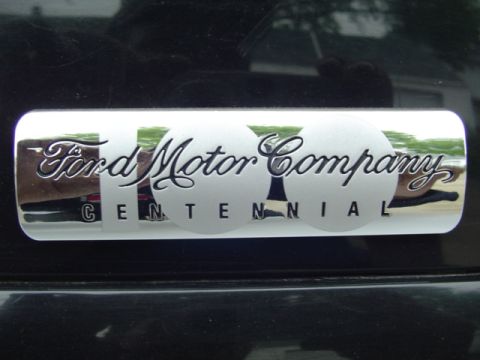 2003 Ford Crown Victoria - Close-up of a Ford Motor Company Centennial badge.