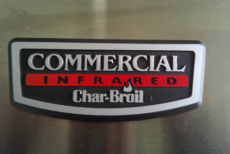 Char-Broil Commercial Infrared emblem on a brushed metal surface