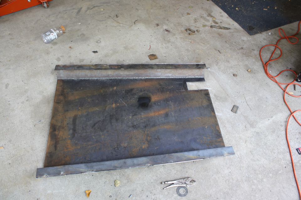 Metal plate with welded edges on concrete floor
