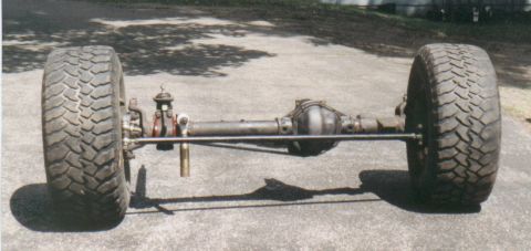 1980 Ford Bronco - I rolled the rebuilt axle out of the garage for the first time. You can see the epoxy in the coil adapter at this point.