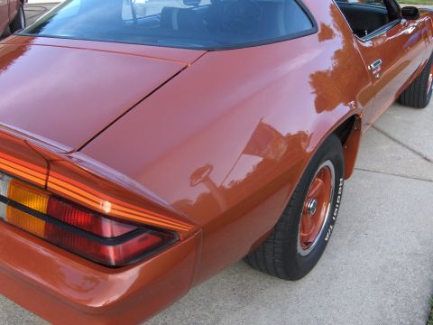 1980 Chevrolet Camaro - This vehicle's rear quarter panel and taillight assembly are visible in the photo.