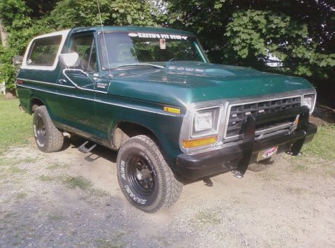 1979 Ford Bronco - This 1978 Ford Bronco features a bull bar and a hood scoop, with a "Kathy's Pit Stop" sticker on the windshield.