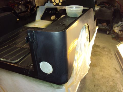1948 Jeep Wrangler - This Jeep CJ-5's rear quarter panel and bed are visible, suggesting a model year around 1976 based on its body style.