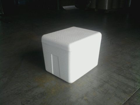 1970 Mercury Cougar - A white styrofoam cooler sits on a dark concrete floor in what appears to be a warehouse.