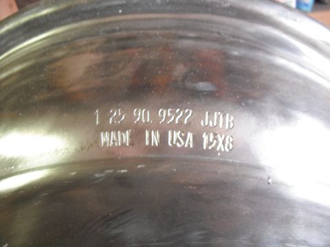 1991 Ford Bronco - This wheel rim has manufacturing date and size information stamped on it.