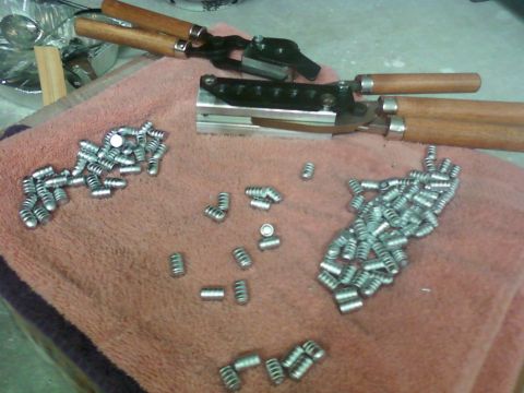 1996 Ford Bronco - Bullet casting mold and freshly cast bullets are laid out on a towel.