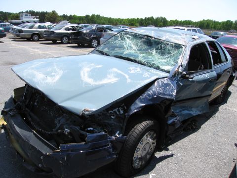 1991 Ford LTD Crown Victoria - This 1991 Ford Crown Victoria LTD sustained significant damage to its front end and windshield.