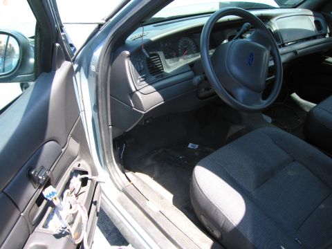 1991 Ford LTD Crown Victoria - Interior view of a 1991 Ford Crown Victoria LTD, highlighting the dashboard and driver's area.