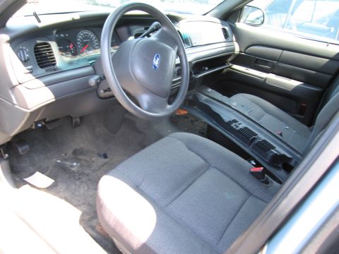 1991 Ford LTD Crown Victoria - Interior view of a 1991 Ford Crown Victoria LTD, including the dashboard and front seats.