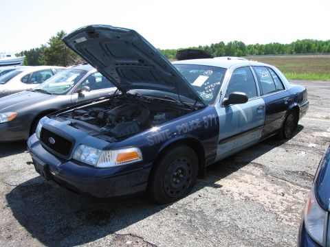 1991 Ford LTD Crown Victoria - Ford Crown Victoria Police Interceptor with hood open, showing the engine bay.