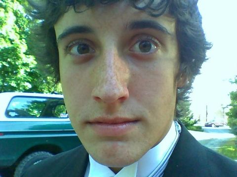1979 Ford Bronco - A green and white Ford Bronco from 1978 is visible in the background of a selfie.