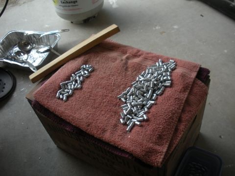 1996 Ford Bronco - Small screws laid out on a towel, possibly for a project.