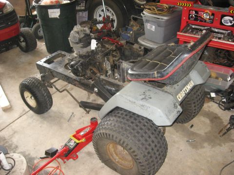2010 Kawasaki BAYOU 220 - This is a lawn tractor frame with the engine exposed, showing a Craftsman seat.