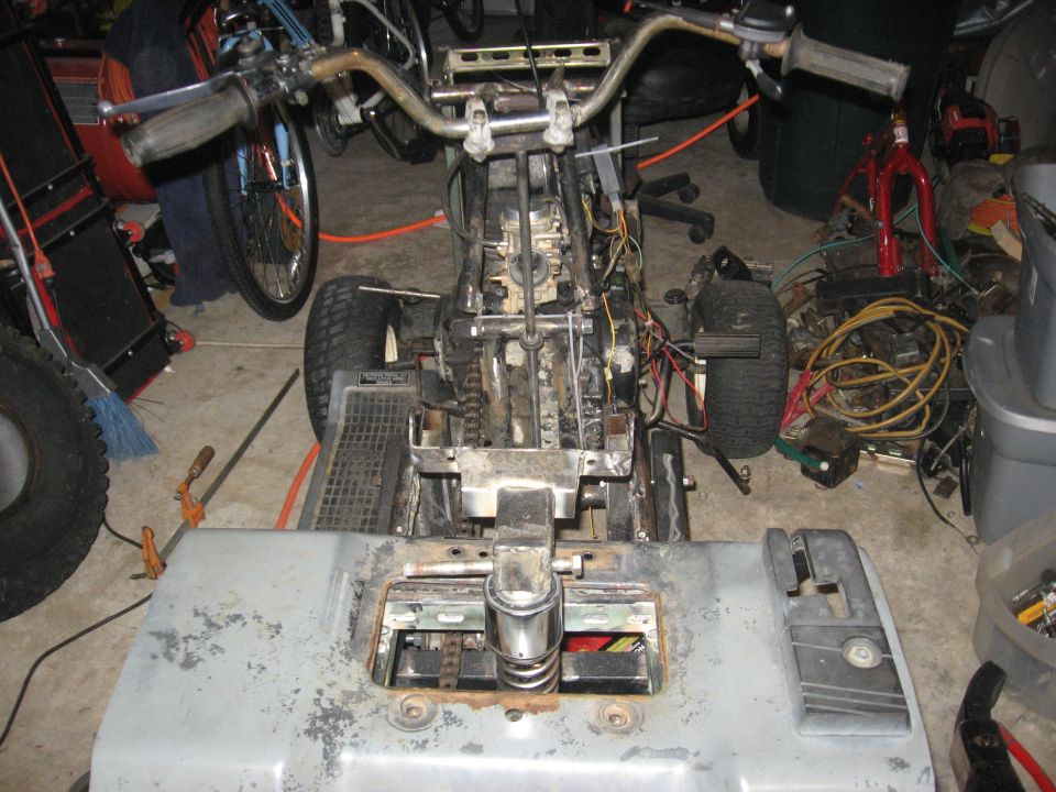 Lawn tractor frame and engine components, front view