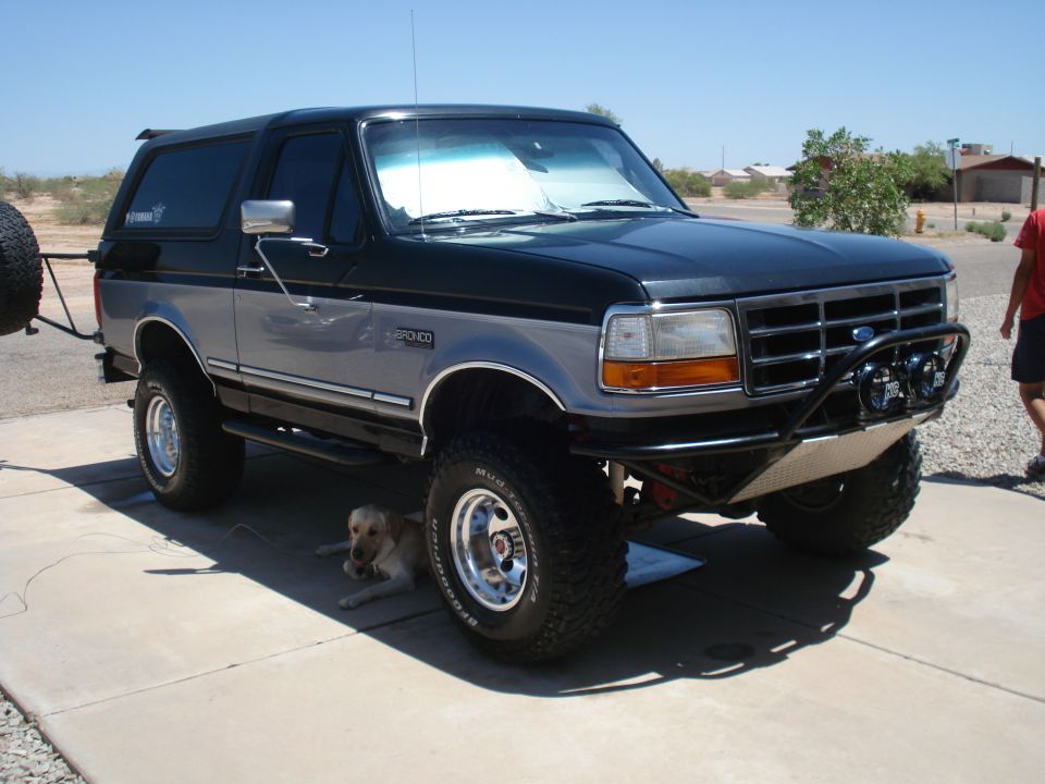 Black Ford Bronco parked outside on a sunny day