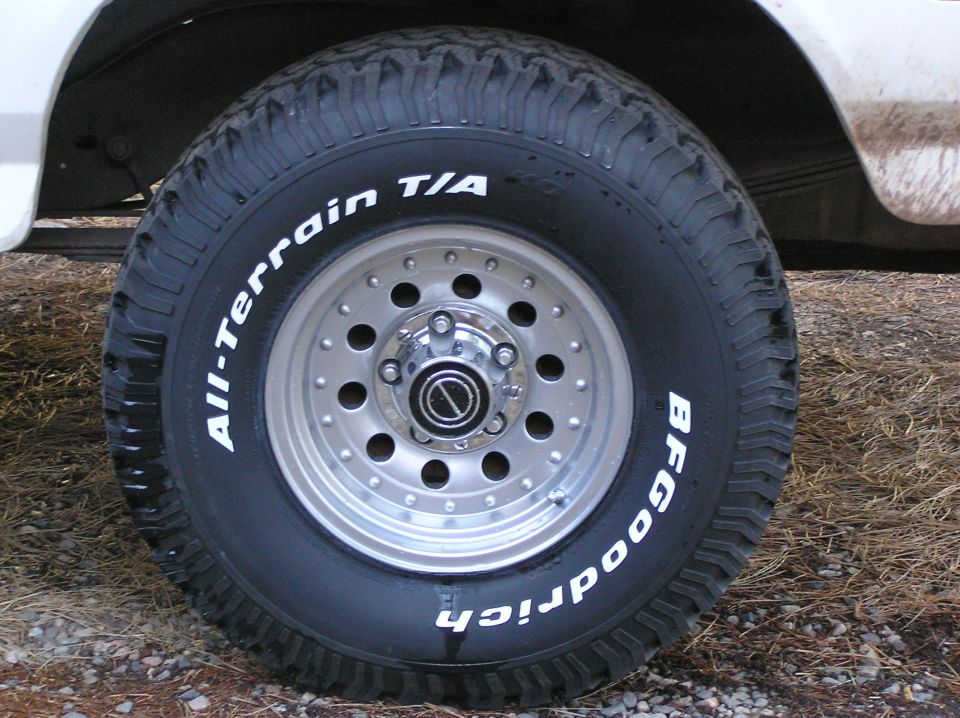 Close-up of a BFGoodrich All-Terrain T/A tire on a vehicle wheel