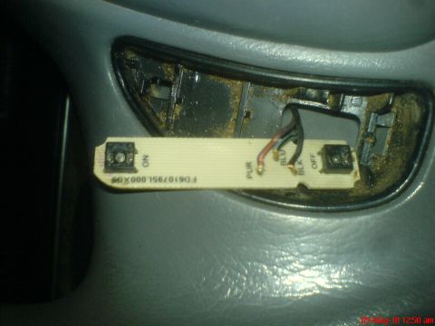 1998 Ford Crown Victoria - Close-up of a circuit board, likely for a cruise control switch, showing wire connections and labels.