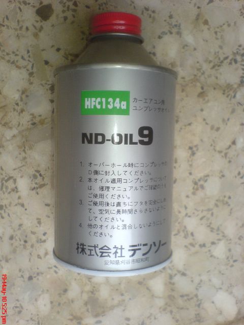 1998 Ford Crown Victoria - A can of ND-OIL9, a refrigerant oil for HFC-134a systems, is shown with Japanese instructions.