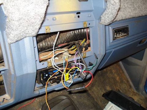 1985 Ford F-150 - The dashboard wiring and aftermarket radio installation in a 1985 Ford F-150.