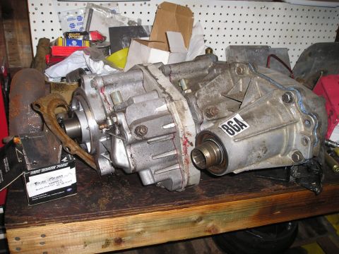 1986 Ford Bronco II - A transfer case, labeled "8GA", is shown, likely for a doubler kit installation.