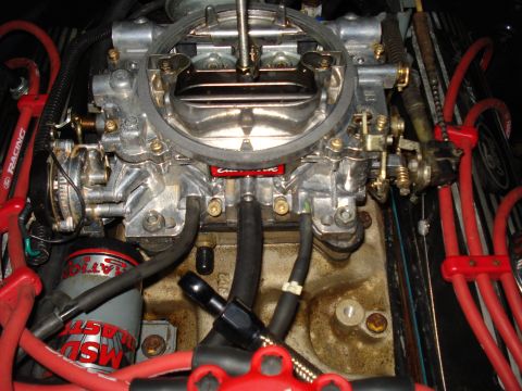 1967 Ford F-250 - Close-up of a Holley carburetor and MSD ignition components.