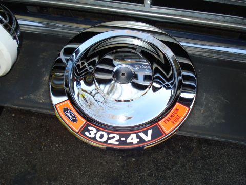 1967 Ford F-250 - Close-up of a chrome air cleaner assembly a 'Ford 302-4V Premium Fuel' decal.