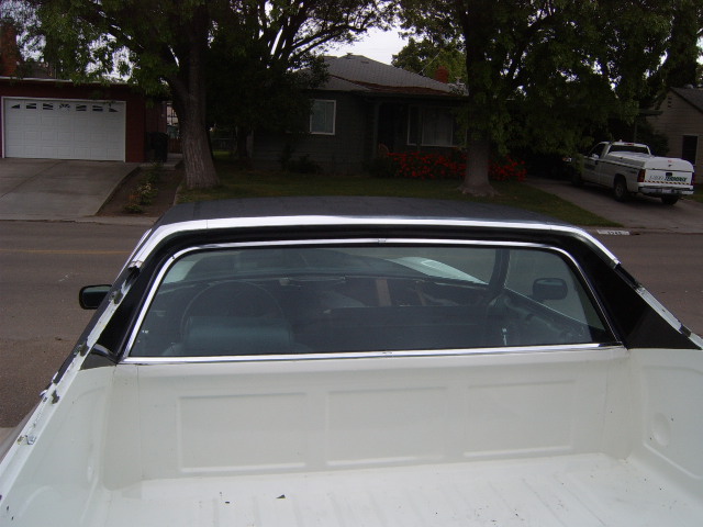1973 Ford Ranchero rear view, white bed and black roof