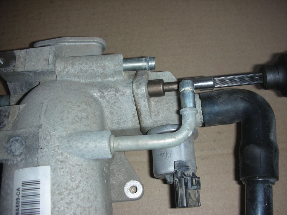 Ford intake manifold with vacuum lines and electrical connector