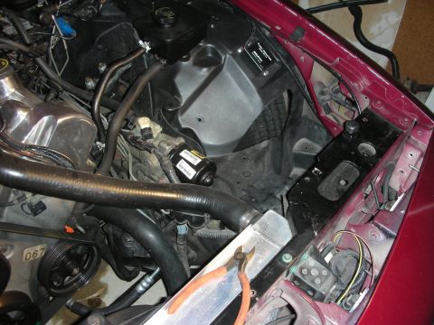 1992 Ford Crown Victoria - The engine bay of a 1992 Ford Crown Victoria shows modifications for an intercooler project.