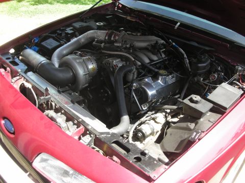 1992 Ford Crown Victoria - Custom engine build a prominent turbocharger and intercooler setup.
