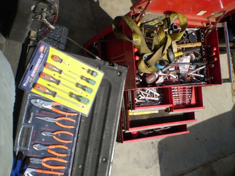 1969 Ford F-250 - A red toolbox and new tool sets are visible in the bed of a truck.