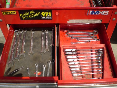 1969 Ford F-250 - A red tool chest displays an assortment of wrenches organized in its drawers.