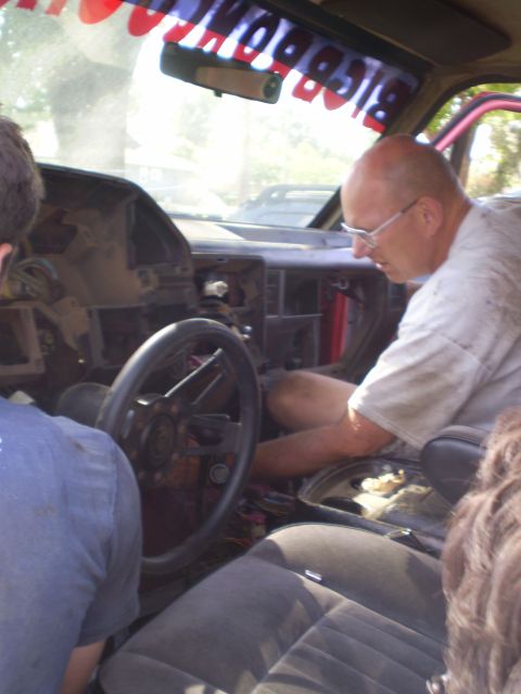 1969 Ford F-250 - Interior view of a vehicle undergoing work, with the dashboard disassembled.