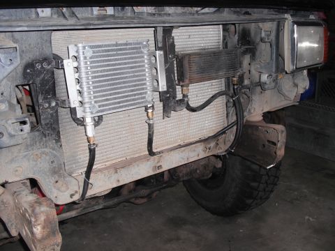 1991 Ford Bronco - An aftermarket engine oil cooler is installed in front of the vehicle's radiator.