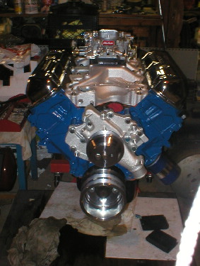 1978 Ford Bronco - A Ford V8 engine is shown with a chrome intake and blue valve covers.