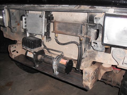 1991 Ford Bronco - Custom winch and oil cooler setup installed on the front of a vehicle.