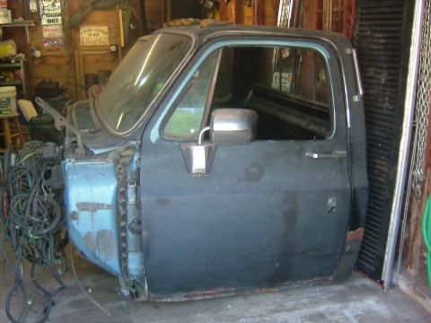 1985 Chevrolet C/K Pickup - This 1985 Chevrolet C/K Pickup truck cab is missing its engine and front end components.