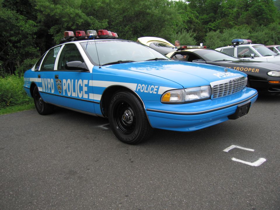Light blue NYPD Chevrolet Caprice police sedan with light bar