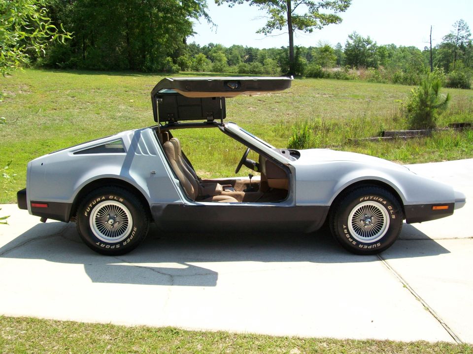 Silver Bricklin SV-1 sports car with gullwing door raised