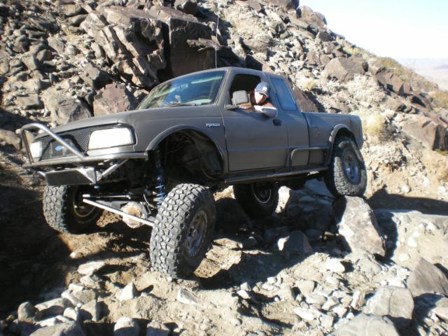 Gray 1997 Ford Ranger on rocky terrain